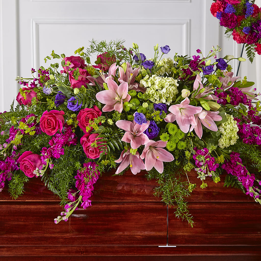 Radiant Tribute Casket Spray – ENCHANTED FLORIST & GREENHOUSE LTD, Maspeth NY