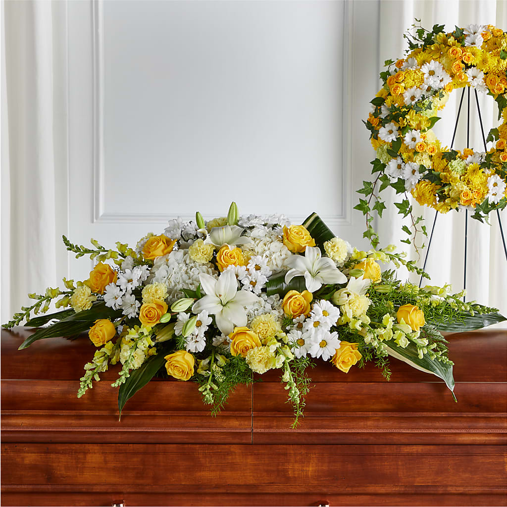 Golden Harmony Casket Spray – ENCHANTED FLORIST & GREENHOUSE LTD, Maspeth NY