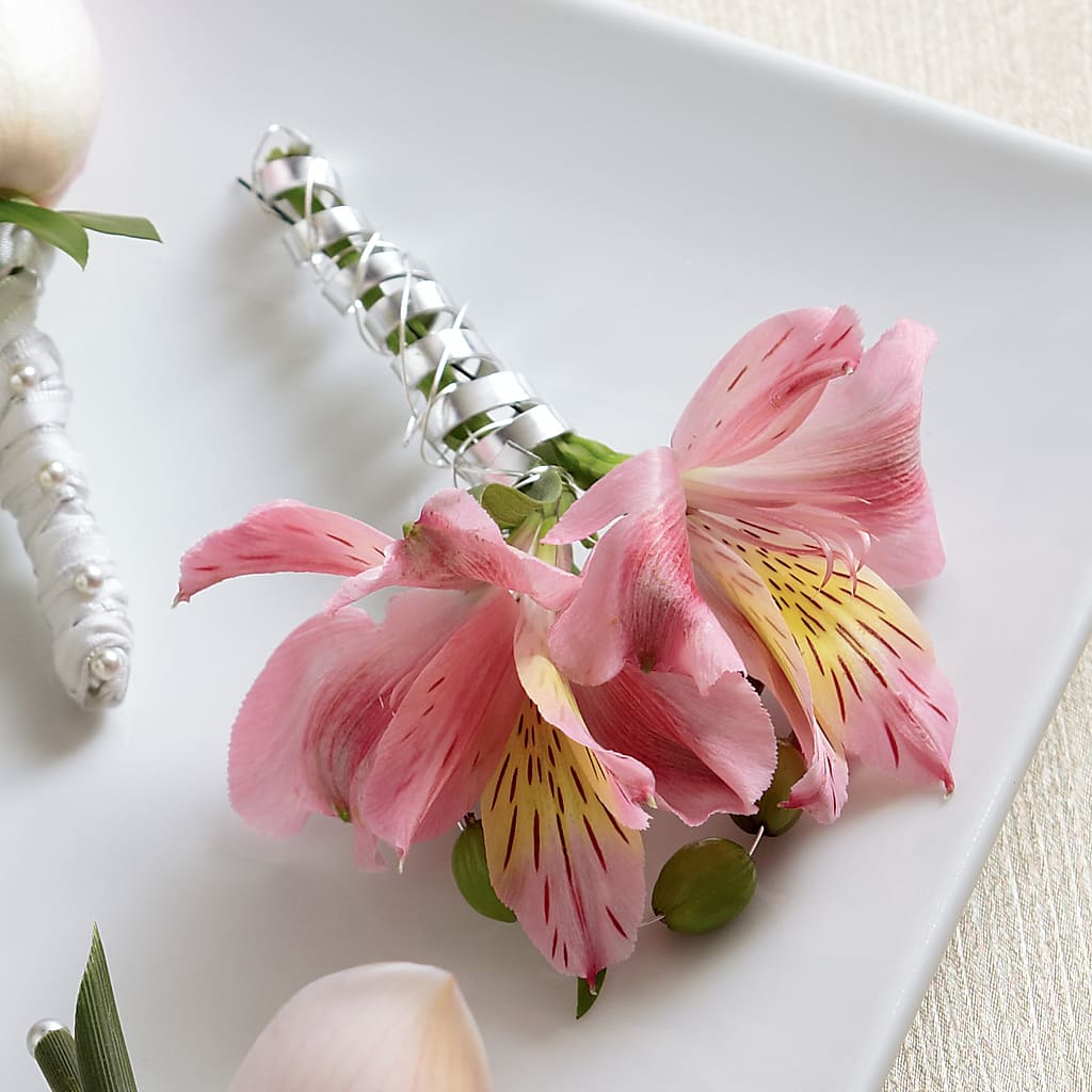 Pink Peruvian Lily Boutonniere – ENCHANTED FLORIST & GREENHOUSE LTD, Maspeth NY
