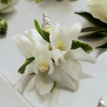White Mini Cymbidium Boutonniere – ENCHANTED FLORIST & GREENHOUSE LTD, Maspeth NY